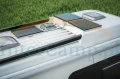 Parked-RV-with-Solar-Panels-286984348.jpg